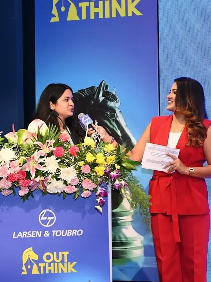 Interviewing a member of the L&T team on stage, creating an engaging segment for the audience.