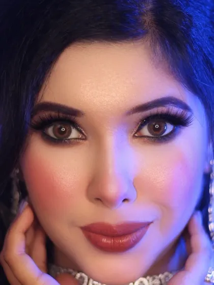 A captivating close-up where the focus is entirely on the eyes and expression. This is a powerful shot for beauty campaigns, demonstrating my ability to connect with the camera.