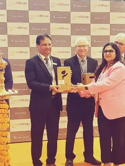 A group of our honored guests and board members during the felicitation ceremony. This photo captures the spirit of collaboration and mutual respect that defines our event.