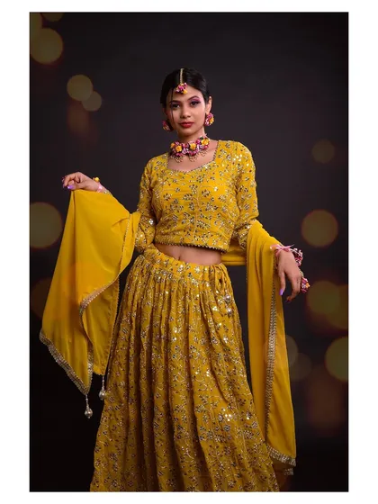 Another full-length view, this time with the dupatta draped gracefully, showing a different way to style the outfit.