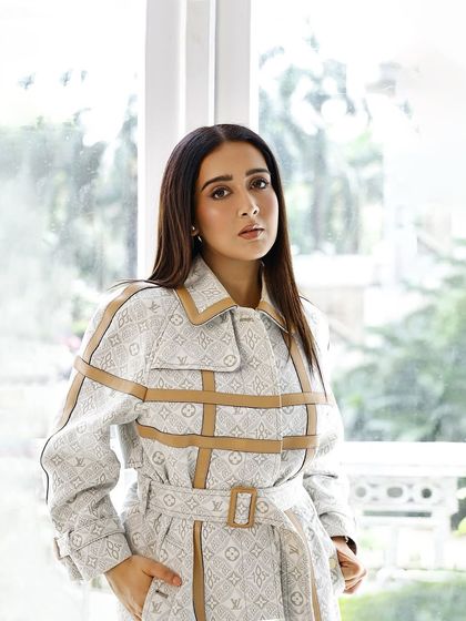 A close-up of the clean beauty look for the Louis Vuitton shoot. The skin is radiant, the brows are groomed, and the eyes have just a touch of definition, creating a look of understated luxury.