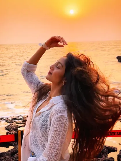It's not all parties. We also chase moments like this. Finding the perfect sunset spot, feeling the salty air in your hair, and just soaking it all in. This is the balance of wild nights and peaceful moments that my trips are all about.