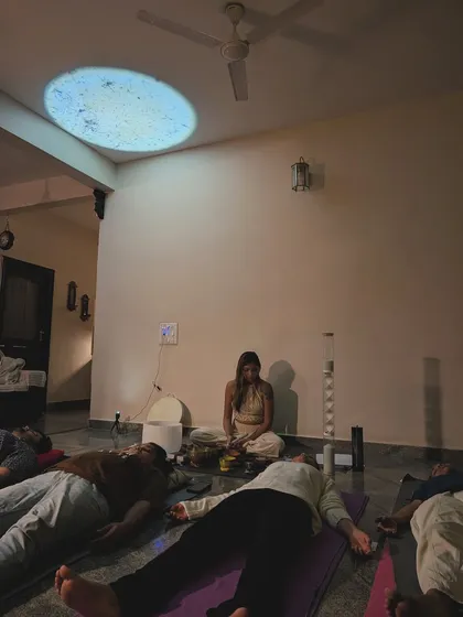 Here is a glimpse into one of my group sound bath meditations. Participants rest comfortably on their mats as I guide them into a state of stillness, surrounded by the gentle resonance of singing bowls and the soft glow of ambient light.