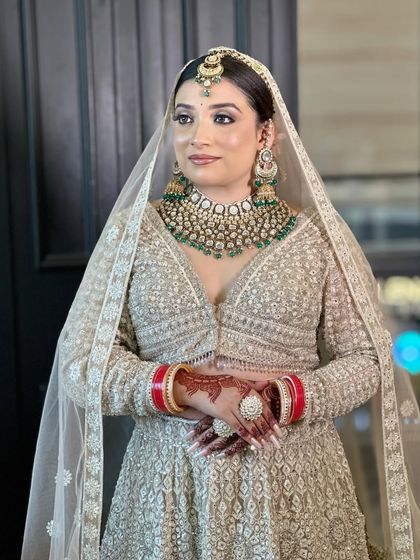 Another angle of the bridal makeup demo, highlighting the flawless base and intricate details of the look.