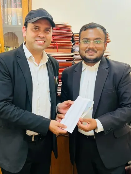 Advocate Imran Khan congratulating Advocate Amit Kumar on his band ceremony. This tradition marks a significant step in a lawyer's career, and we are proud to be part of his journey.