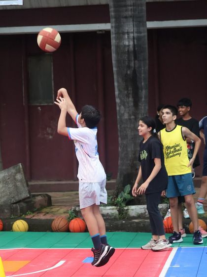 A player takes a jump shot during practice. We focus on proper shooting mechanics to help our players develop a reliable and accurate shot.