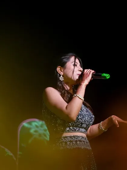 A beautiful moment captured during a wedding performance. Singing romantic songs for someone's special day is truly an honor.