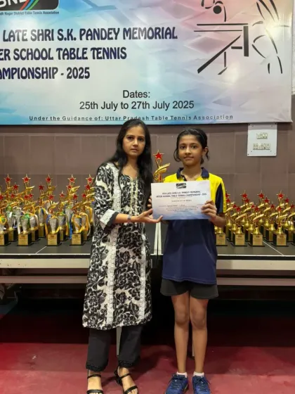 Yashmita Narayan, silver medalist in the U-13 girls' category, being felicitated for her performance.