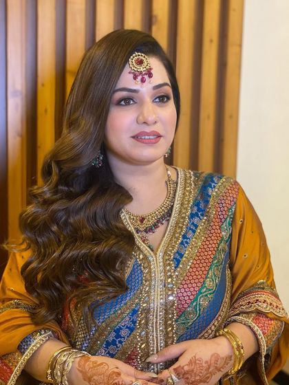 Another photo of my beautiful client with classic Hollywood waves, looking timelessly elegant for her event.