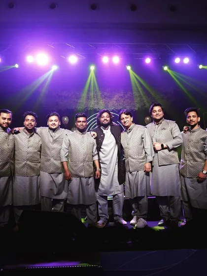 Meet the full Sufi Folks ensemble. We are a team of dedicated musicians who always arrive dressed to match the elegance of your event. This photo captures our unity and professionalism on stage, ready to create a magical evening.