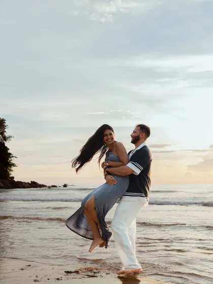 The pure, uninhibited joy of an elopement shoot. We captured this playful lift on the shores of Phuket, a perfect example of the laughter and friendship that are at the heart of every love story we tell.