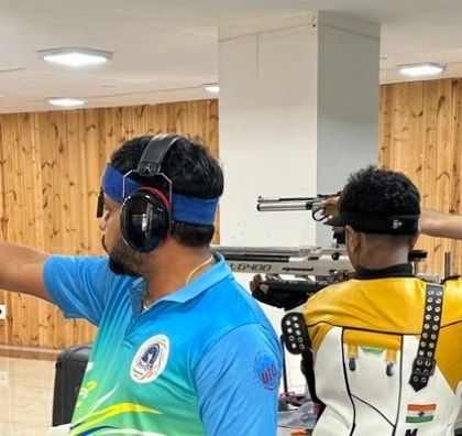 Adult shooters taking aim during a guest session. These introductory experiences are not just for kids; they are a popular choice for adults and corporate groups looking for a unique team-building activity.