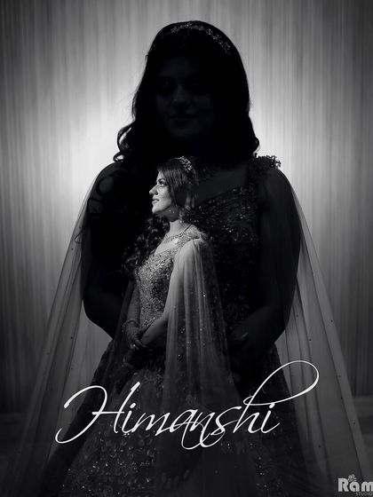 An artistic black and white portrait of the bride, "Himanshi," using a silhouette effect to create a dramatic and memorable image.