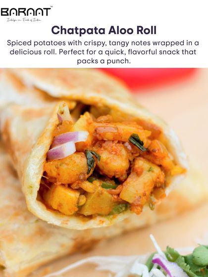 Our Chatpata Aloo Roll is filled with spiced potatoes with crispy, tangy notes, perfect for a quick and flavourful snack.