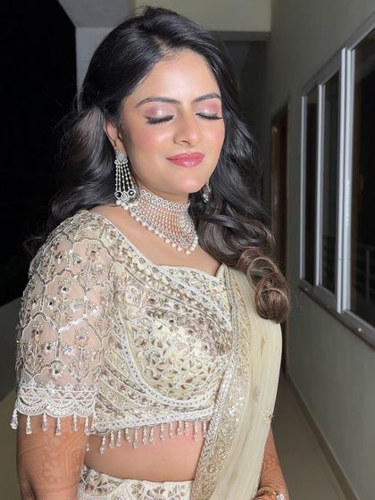 A close-up of this simple and elegant Roka makeup. The soft pink eyeshadow and glowing skin create a fresh and youthful look that is perfect for the occasion.