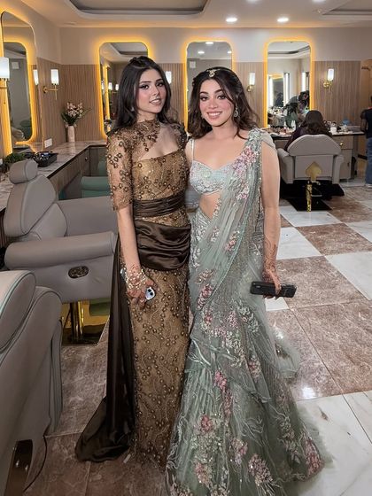 Glowing together, sisters forever. Another shot of this beautiful duo, showcasing their coordinated yet individual styles.