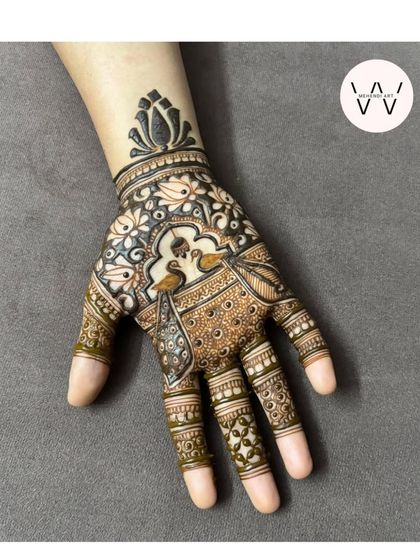 A final, clear shot of the beautiful peacock and lotus design created for my sister.