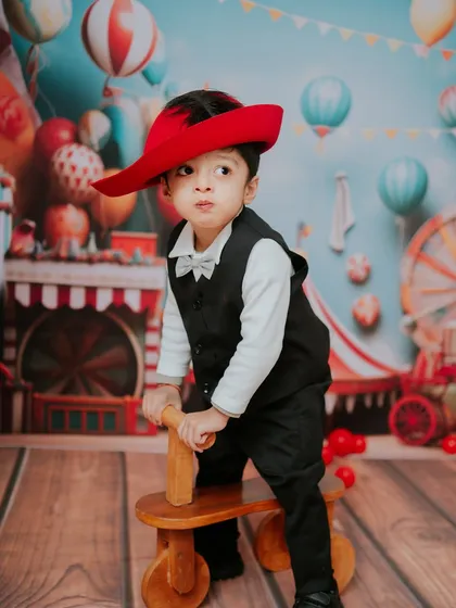A curious glance from the birthday boy. Every photo from this session tells a story of fun, imagination, and turning two.