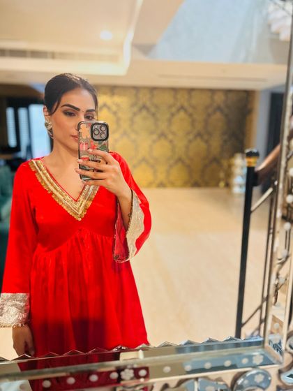 Throwback to a favorite red velvet suit I designed. The bell sleeves and gota patti work give it a regal, old-world charm.