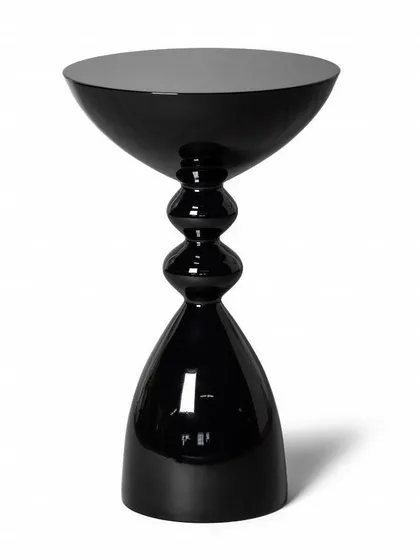 An inspirational design for a side table with a glossy black powder-coated finish. Its stacked, geometric form makes it a sculptural accent piece for any contemporary space.
