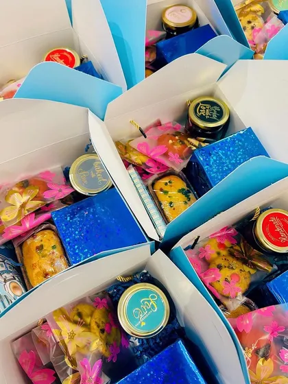 Another view of the birthday return favor boxes. I can work with different color themes and contents to match your party's style.