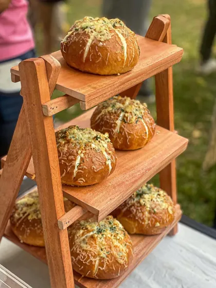 A display of my Korean Cream Cheese Buns at a pop-up event. They are always a crowd favorite.
