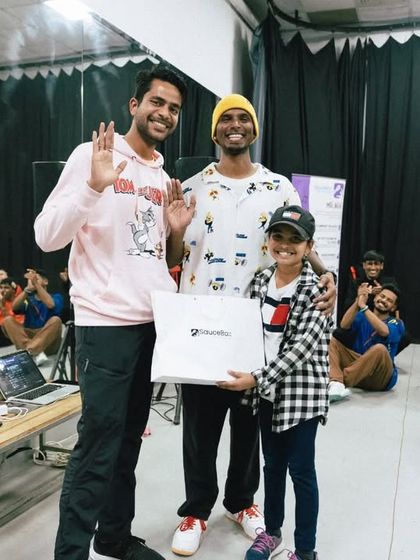 A proud moment, awarding a prize to a young, talented student at the end of a workshop.