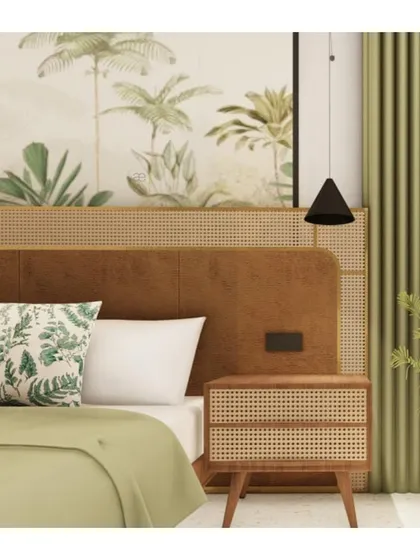 Another render of the tropical bedroom, focusing on the headboard design which combines a leather finish with a rattan panel and a large botanical artwork.