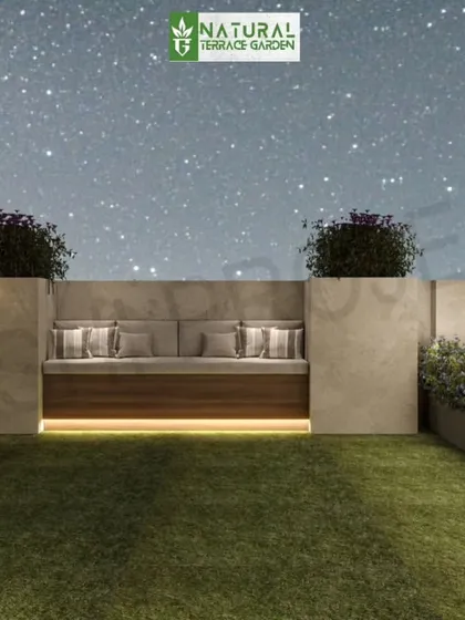 A serene night-time render of a proposed terrace, featuring a cozy built-in seating nook and subtle garden lighting.