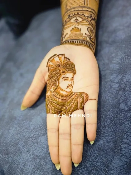 A single groom portrait on the palm. This is a great option for brides who want to feature their partner, or for the groom himself.