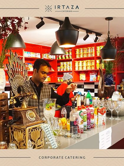 A vibrant bar setup at a corporate event. My team is ready to serve drinks, showcasing that my services can extend beyond food to complete beverage solutions for your party.