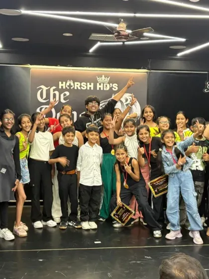 The smiles and peace signs say it all. A group of our 9-14 year old performers celebrating after a successful and fun competition.