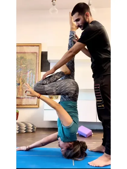 Age is just a number on the yoga mat. This is my student Chhavi, who at 47 is mastering a complex headstand variation. With consistent practice and personalized guidance, you can achieve goals you never thought possible.