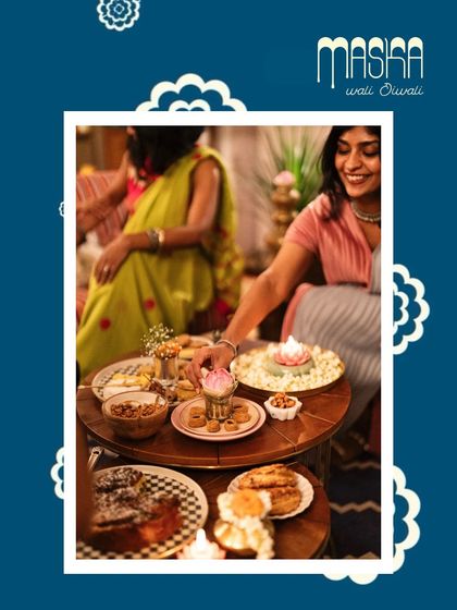 A festive scene with a guest enjoying the beautiful spread from our Diwali collection.