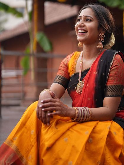 Sitting on the steps, enjoying the festive atmosphere.