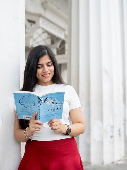 A simple, elegant portrait of the bride-to-be enjoying a quiet moment. These individual shots are a beautiful part of the pre-wedding narrative.