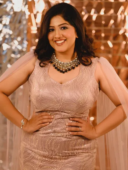A close up of Meghana's awards night look. I used a neutral-toned smokey eye and a glossy lip to create a sophisticated and polished style.