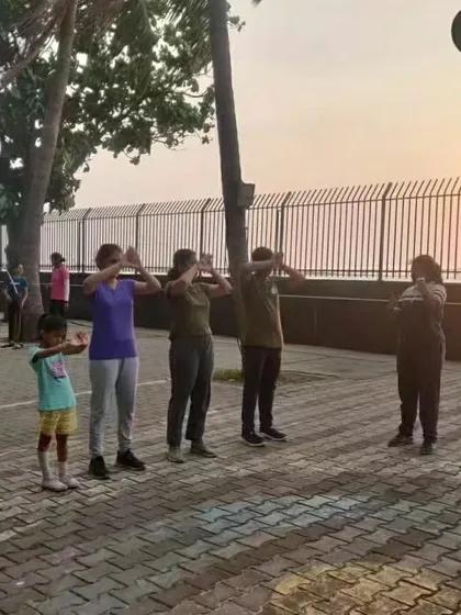 Warm-up exercises against the sunset at our Dadar range. A perfect way to start a session.