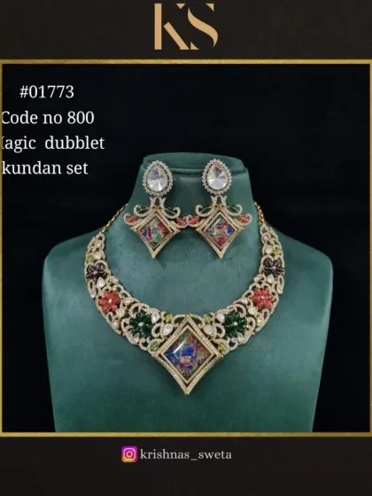 Another variation of the multi-color magic dubblet Kundan set, featuring beautiful hand-painted details within the stones. This is a truly artistic piece.
