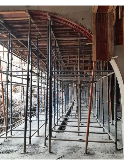 The complex scaffolding required to construct the arched forms of Sanskriti Vihara. This project, won in competition 8 years ago, is like a ship on soil, a testament to engineering and architectural vision.