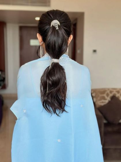 The full back view of the rhinestone bubble ponytail, showing the clean lines and the eye-catching sparkle of the accessories.