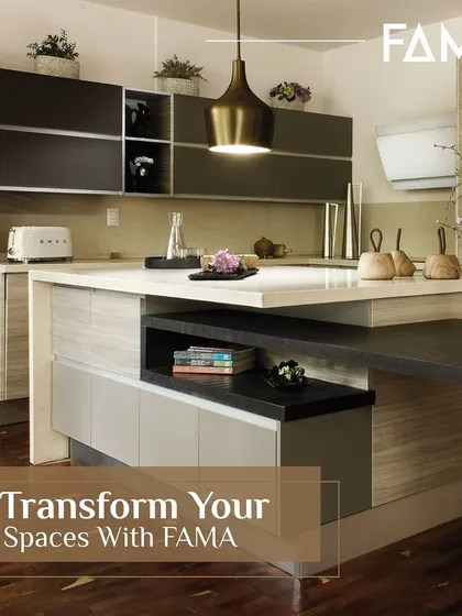 Let me help you transform your spaces. This kitchen uses a multi-level island and a mix of materials to create a highly functional and visually dynamic hub, even within a limited footprint.