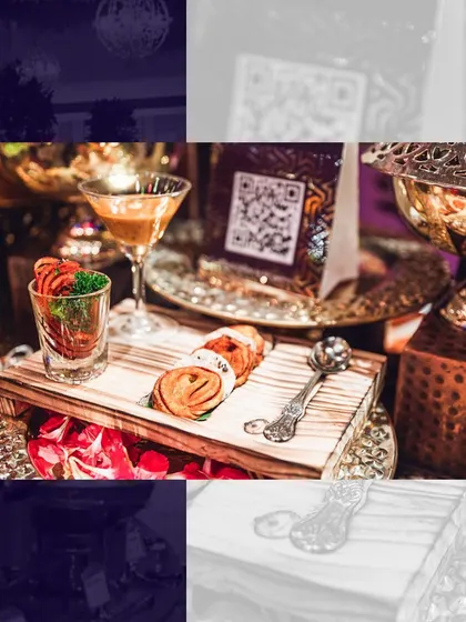 This is a glimpse of your celebration's catering board. A beautifully arranged platter with savory bites and a refreshing drink, designed to create a moment of pure indulgence.