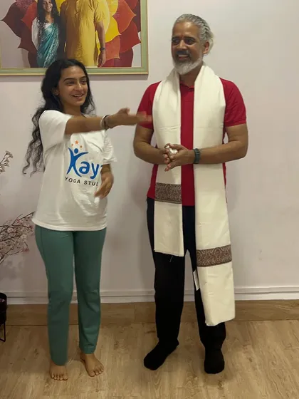 A candid moment of joy and conversation with my guru during his visit. It is an honor to have him bless our space and our community.