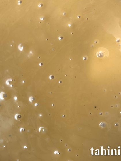 We use tahini to add richness and a complex, savory note that balances the sweetness of the cookie perfectly.