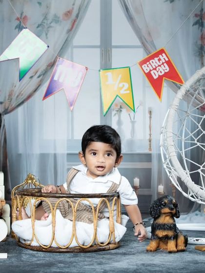 A classic half-birthday portrait with vintage-style props.