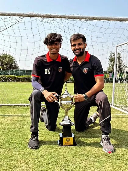 Our coaches with the trophy after our U-11 team secured 3rd place in the GYL Gold Cup.