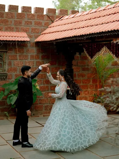 A twirl of happiness. Lavanya looks radiant as she dances with Akshay during their reception at The Peacock Grove.
