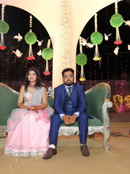 Posing on the stage seating after our performance. I help couples feel confident not just while dancing, but in every moment they are in the spotlight.