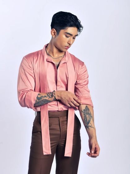 A softer, more romantic look. This shot shows versatility in styling, moving from edgy to elegant within the same editorial.